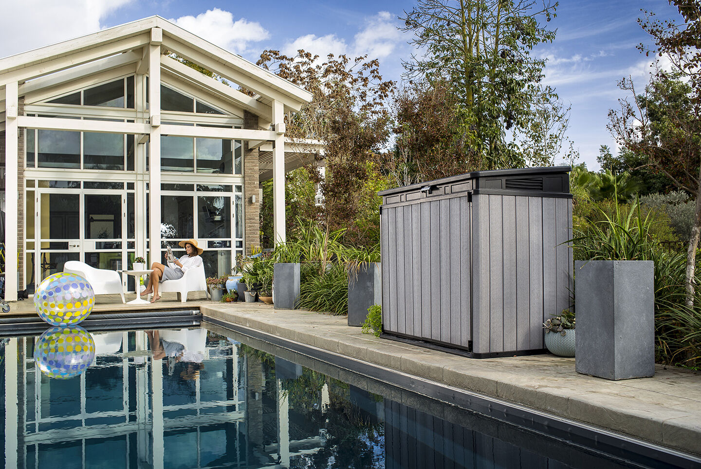 Elite Store Storage shed by Keter by the pool